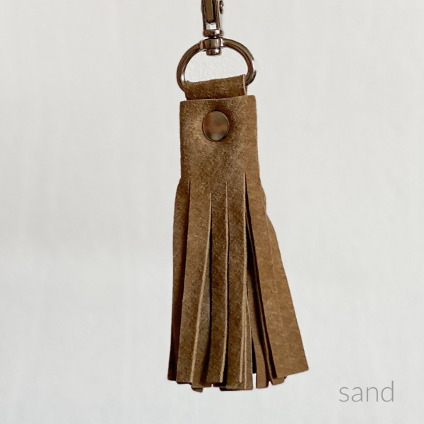 Quaste, sand
